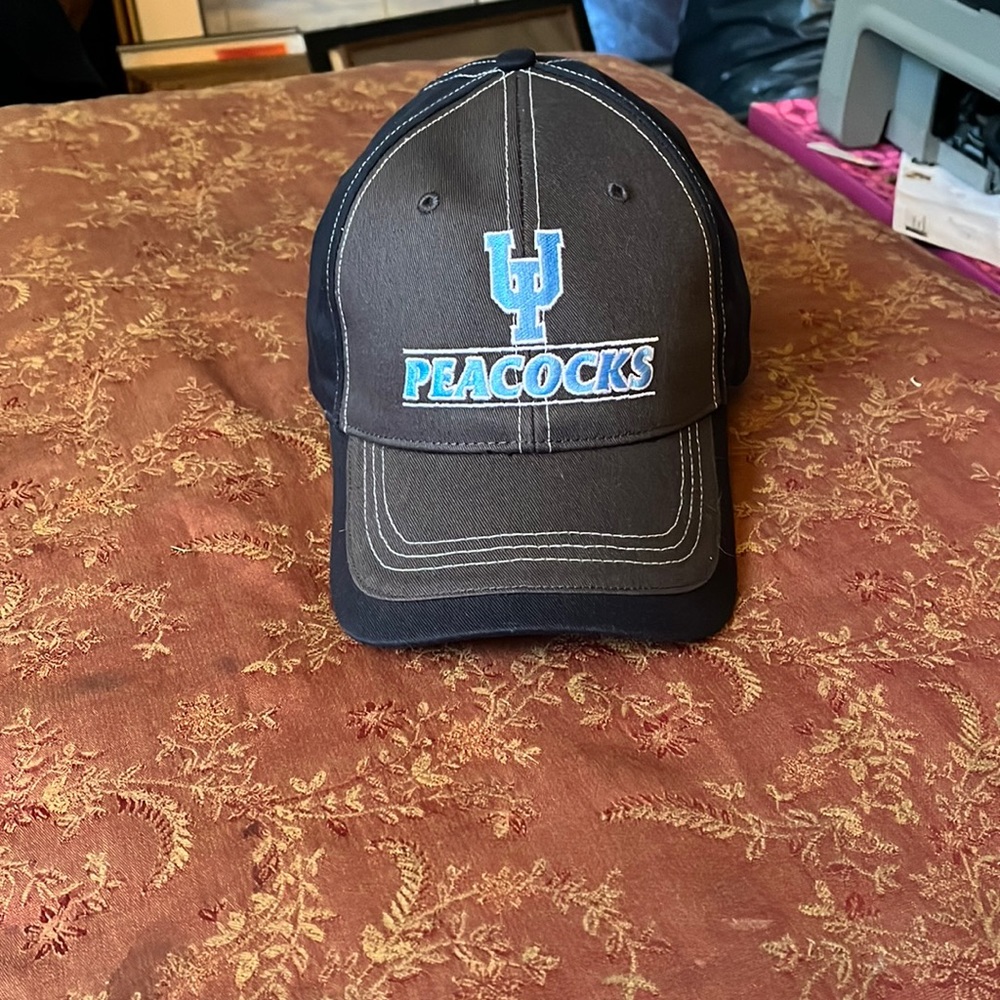 Upper Iowa University peacocks hat